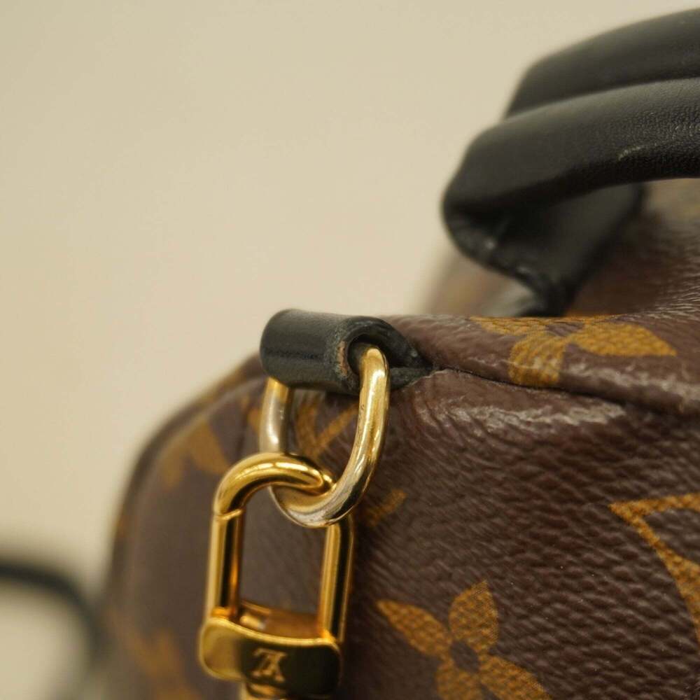 LOUIS VUITTON Brown Monogram Backpack - Picture 11 of 13